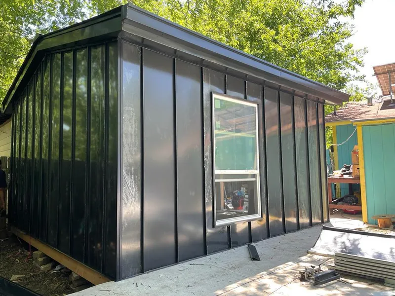 Black standing seam metal wall panels for Roof Inspection in Etowah